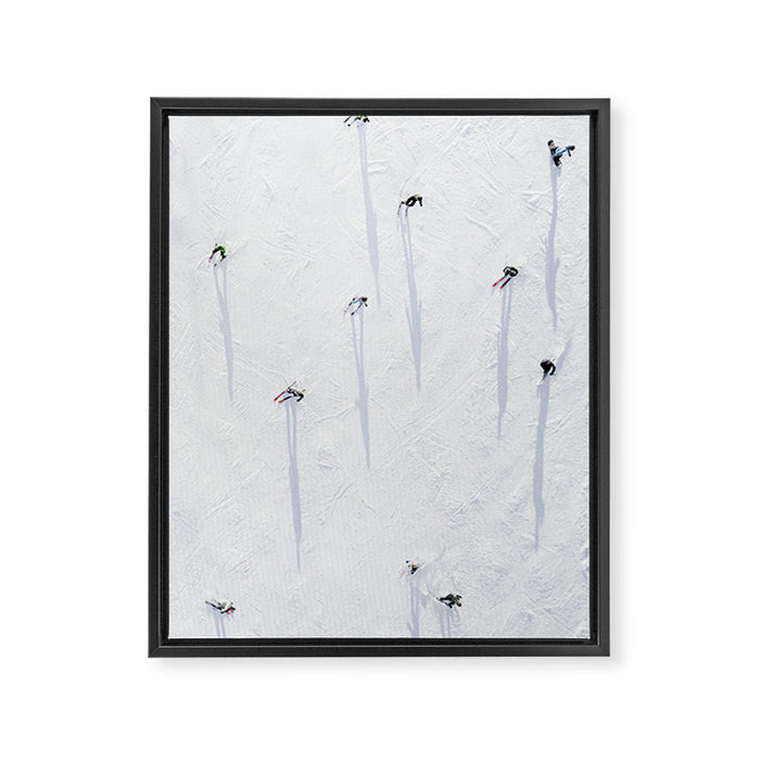 Aerial shot of skiers Framed Canvas Print Gallery Image 1