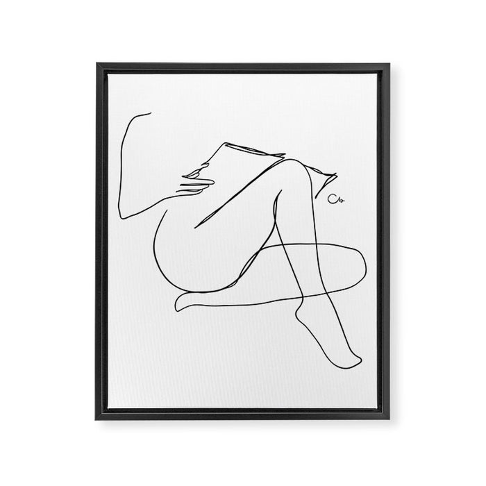 Reading Naked Framed Canvas Print Gallery Image 1