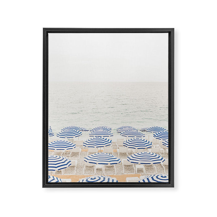 Blue Striped Umbrellas of the French Riviera | Nice, France beach photography Framed Canvas Print Gallery Image 1