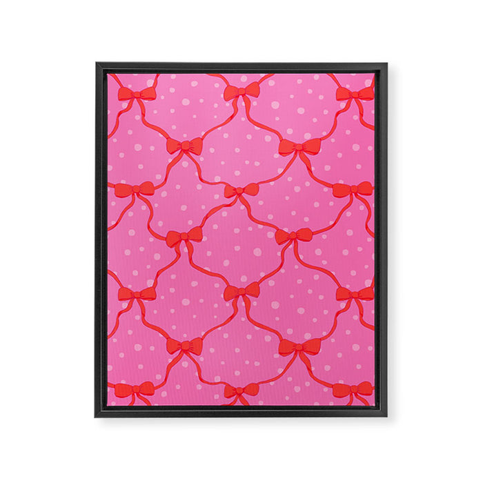 Christmas bows with snow, pink and red Framed Canvas Print Gallery Image 1