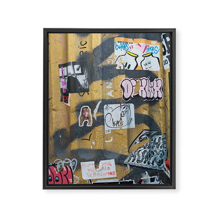 graffiti on the wall Framed Canvas Print Gallery Image 1