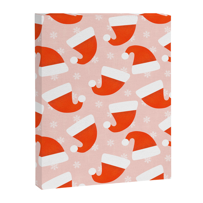 Red Santa Hats & Snowflakes on Linen Pink - Modern Festive Pattern Canvas Print Gallery Image 1