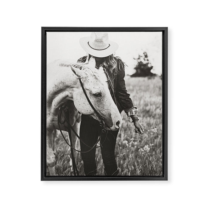 A Cowgirl & Her Horse - Black & White Photo Framed Canvas Print Gallery Image 1