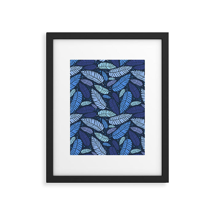 Tropical palm leaves pattern in blue Framed Art Print Gallery Image 1